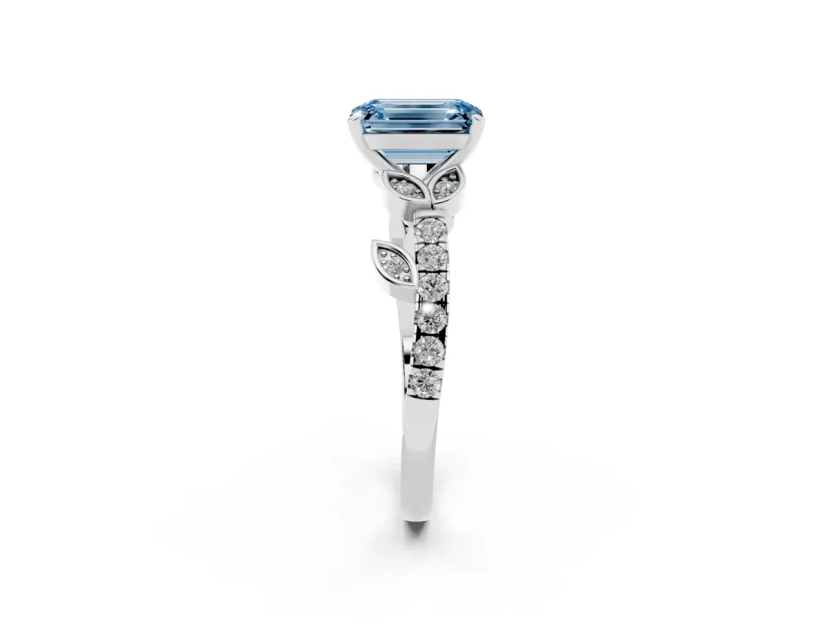 Fancy Blue Emerald Cut Solitaire Leaf-Inspired Diamond Ring with Pavé Band and Four-Prong Setting Silver