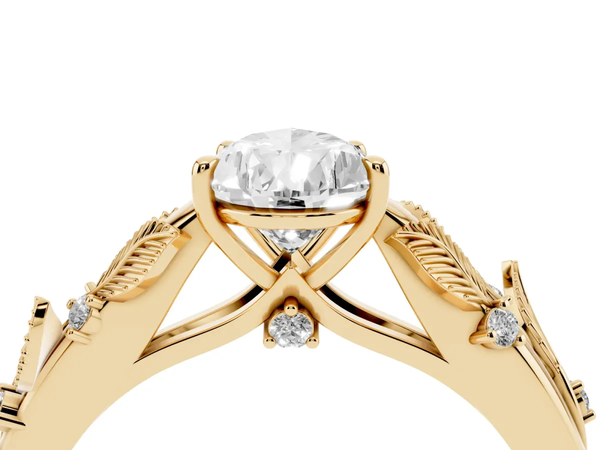 Pear Cut Diamond Solitaire Ring with Leaf Motif Band and Four-Prong Setting Yellow gold