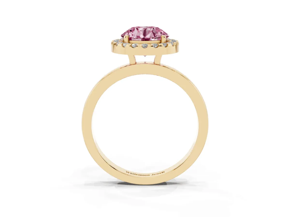 Fancy Pink Round Cut Halo Diamond Solitaire with Pavé Band and Four-Prong Setting Yellow gold