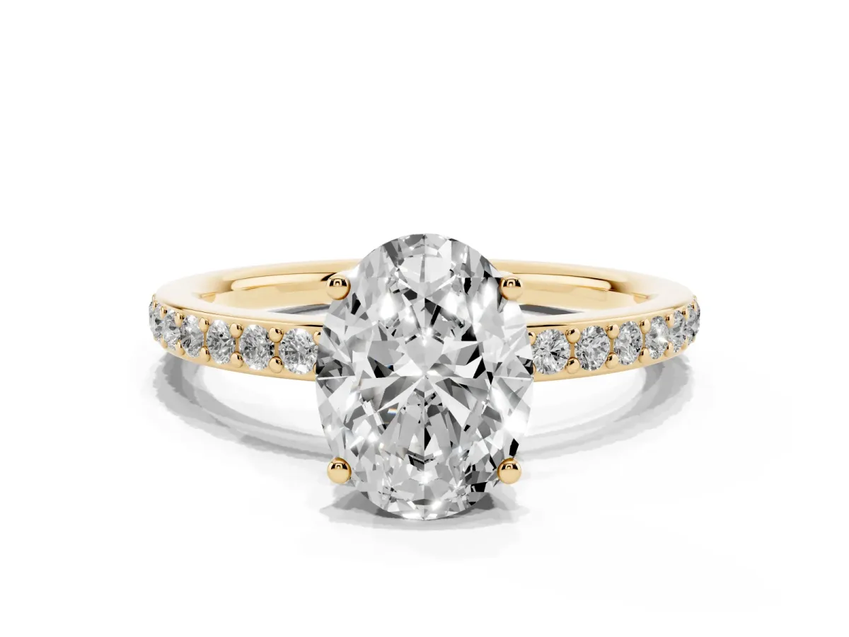 Oval Cut Cut Diamond Pavé Band Ring with Four-Prong Setting Yellow gold