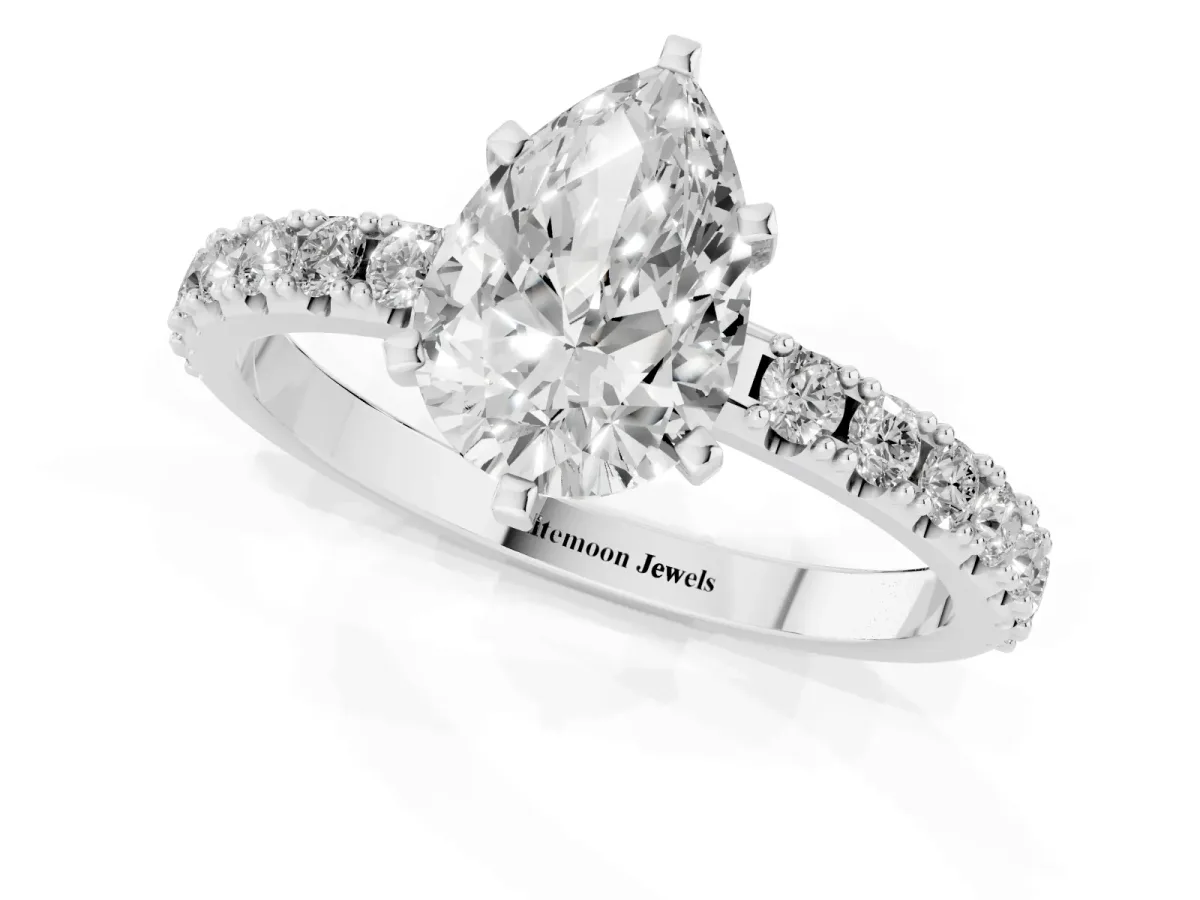 Pear Cut Diamond Solitaire Pavé Band with Four-Prong Setting Silver