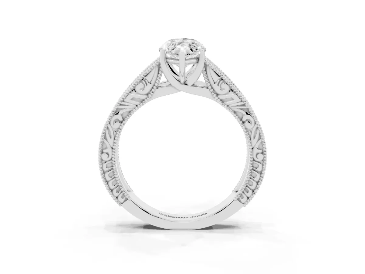 Marquise Cut Diamond Solitaire Ring with Engraved Band and Four-Prong Setting Silver