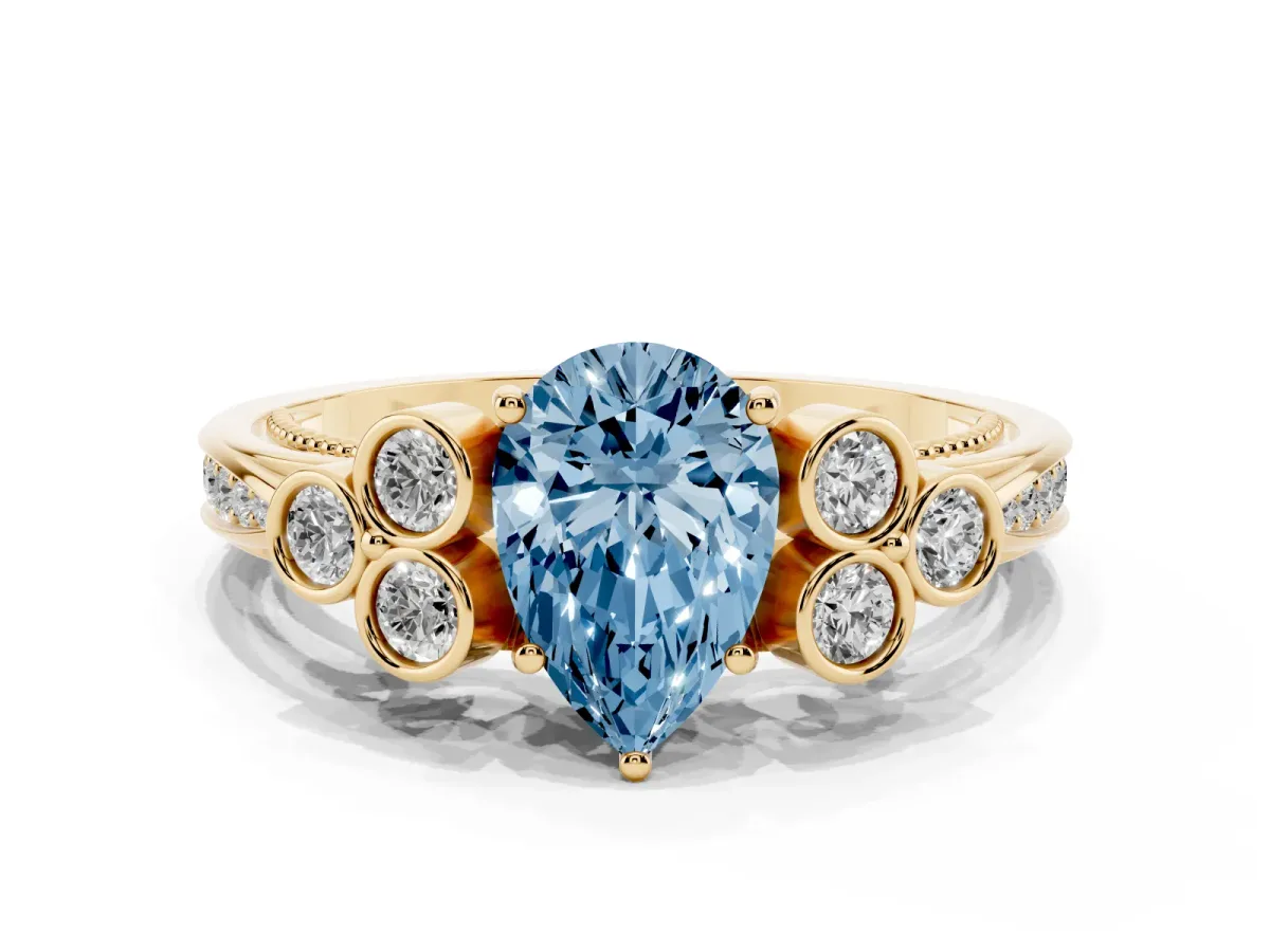 Fancy Blue Pear Cut Cut Diamond Engagement Ring with Bezel Set Round Side Stones and Prong Setting Yellow gold