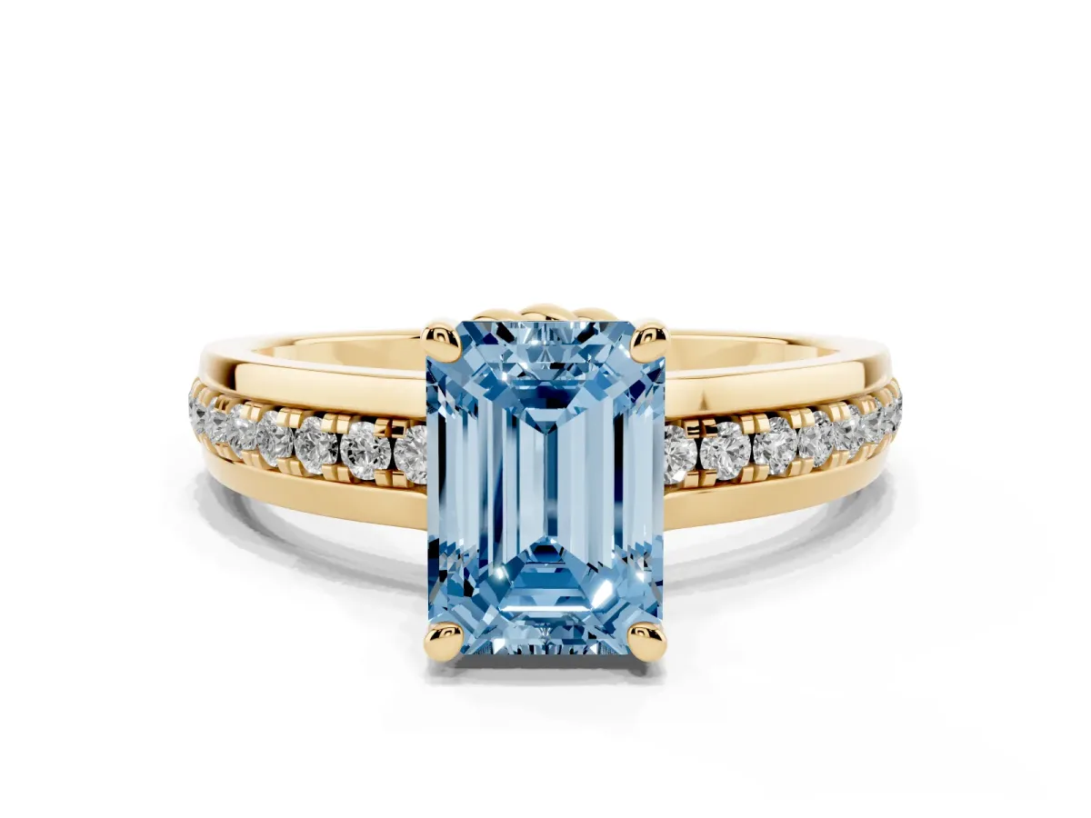 Fancy Blue Emerald Cut Solitaire Diamond Ring with Channel Set Band and Six-Prong Setting Yellow gold