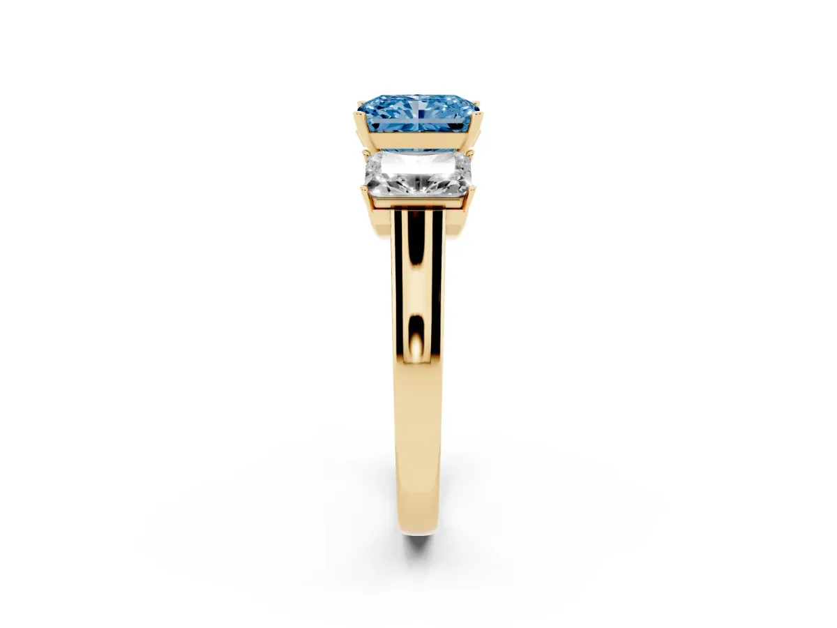 Fancy Blue Three-Stone Radiant Cut Brilliant Diamond Trellis Ring with Comfort Fit Band Yellow gold