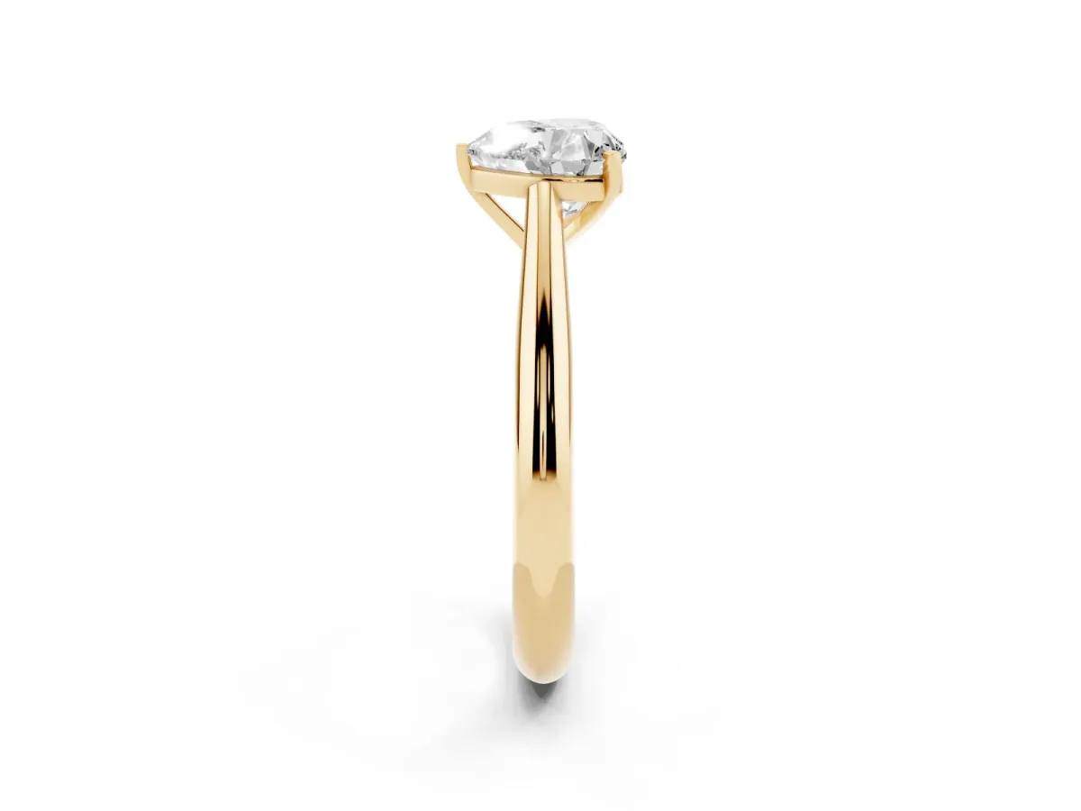 Heart Cut Diamond Solitaire Engagement Ring with Cathedral Setting and Four-Prong Mount Yellow gold