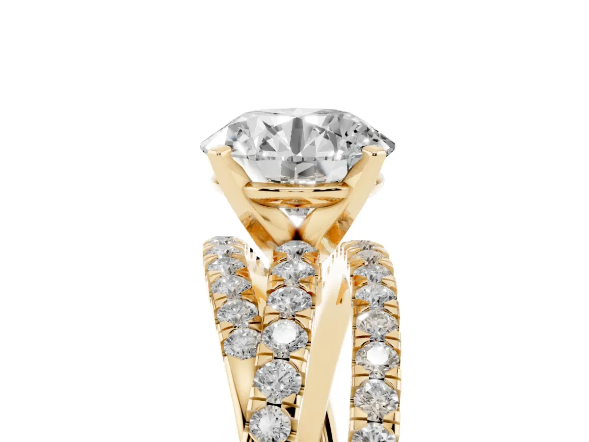 Round Cut Solitaire Twist Band with Pavé Setting and Four-Prong Setting Yellow gold