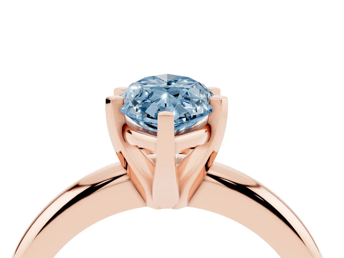 Fancy Blue Marquise Cut Diamond Solitaire Engagement Ring with Round Band and Four-Prong Setting Rose gold