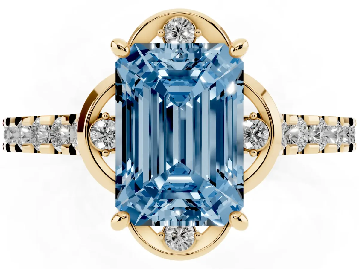 Fancy Blue Emerald Cut Diamond Ring with Pavé Band and Floral Prong Setting Yellow gold