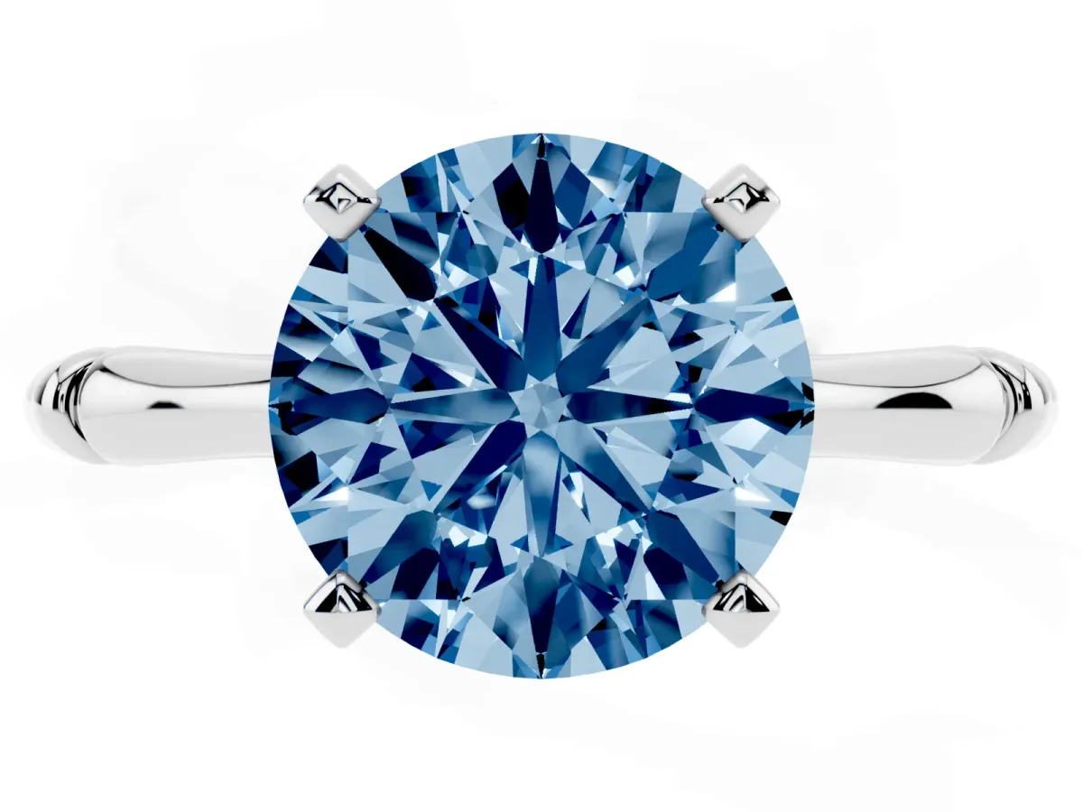 Fancy Blue Round Cut Solitaire Diamond Ring with Bamboo Band and Four-Prong Setting Silver