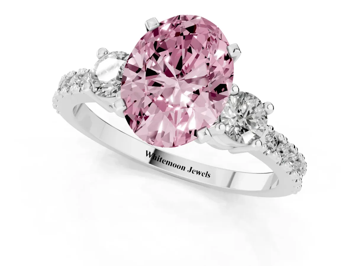 Fancy Pink Oval Cut Three-Stone Diamond Pavé Band with Prong Setting Platinum