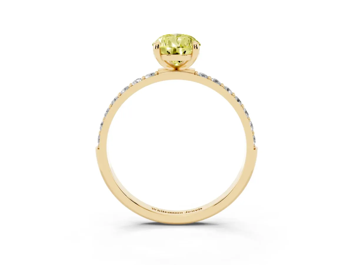 Fancy Yellow Pear Cut Diamond Solitaire Ring with Round Pavé Band and Prong Setting Yellow gold