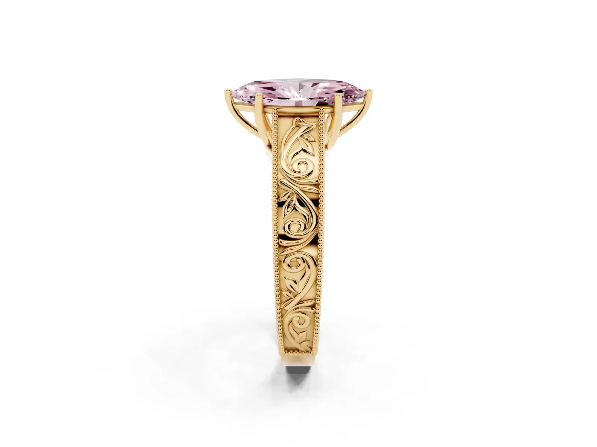 Fancy Pink Marquise Cut Diamond Solitaire Ring with Engraved Band and Four-Prong Setting Yellow gold