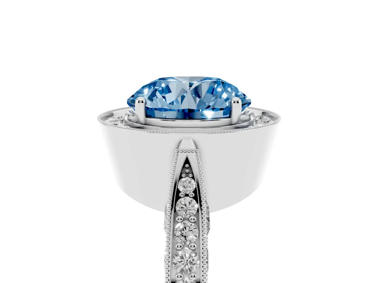 Fancy Blue Round Cut Halo Diamond Engagement Ring with Split Shank Band and Four-Prong Setting Silver
