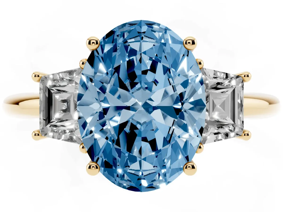 Fancy Blue Oval Cut Diamond Three-Stone Ring with Trapezoid Side Stones and Prong Setting Yellow gold