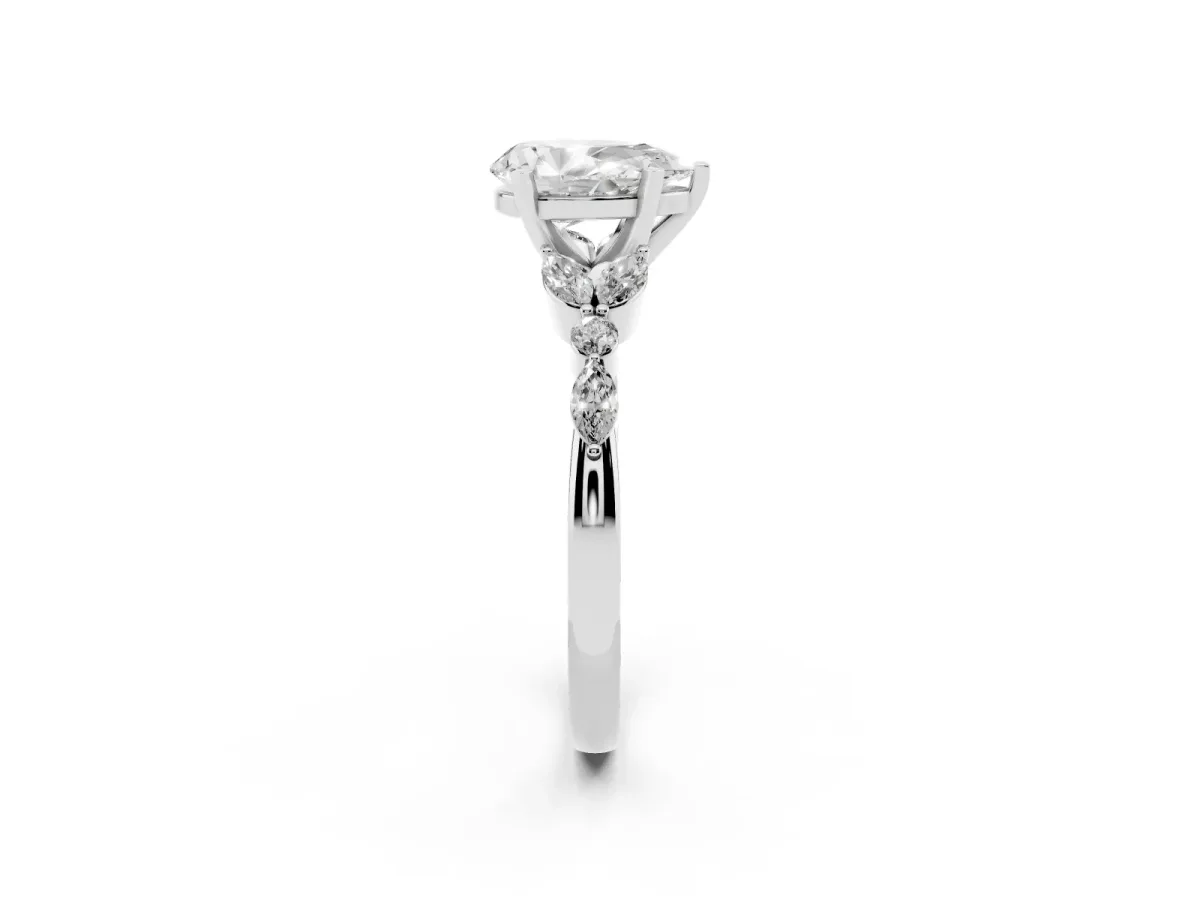 Pear Cut Diamond Solitaire Ring with Side Stones and Four-Prong Setting Silver
