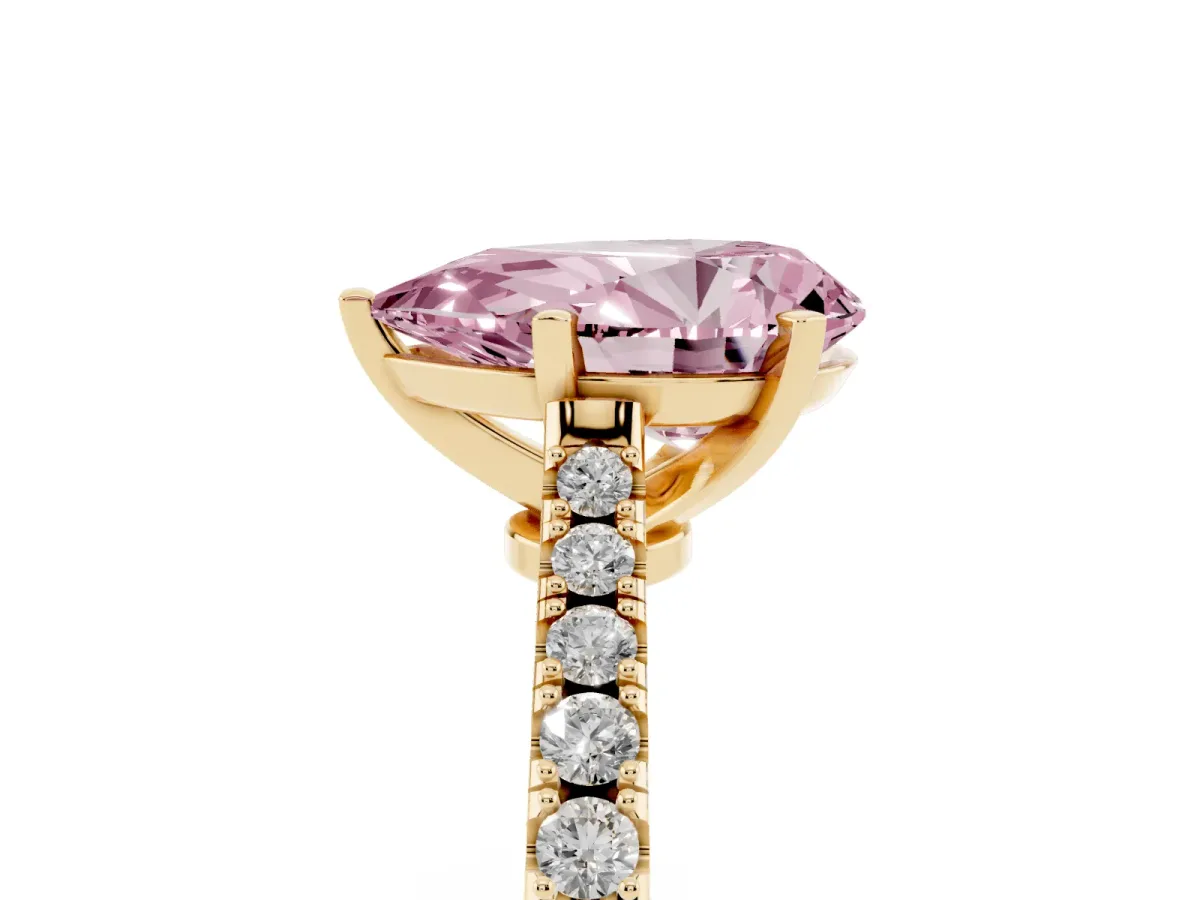Fancy Pink Pear Cut Cut Solitaire Diamond Engagement Ring with Pave Band and Four-Prong Setting Yellow gold