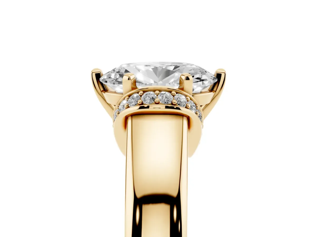 Oval Cut Solitaire Diamond Ring with Pave Band and Six-Prong Setting Yellow gold