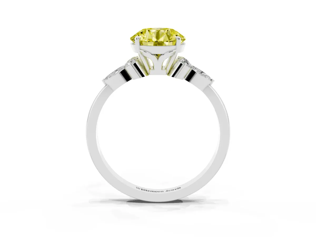 Fancy Yellow Round Cut Brilliant Diamond Solitaire Ring with Pear Side Stones and Four-Prong Setting White gold