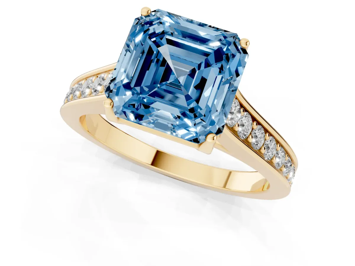 Fancy Blue Asscher Cut Brilliant Cut Diamond Engagement Ring with Pavé Band and Four-Prong Setting Yellow gold