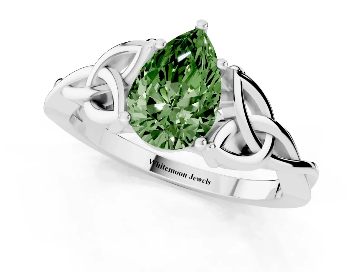 Fancy Green Pear Cut Diamond Solitaire Engagement Ring with Celtic Knot Band and Four-Prong Setting Platinum