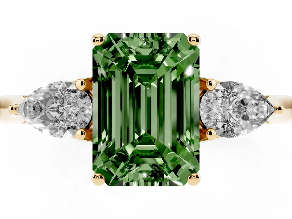 Fancy Green Three-Stone Emerald Cut Brilliant Diamond Solitaire Ring with Tapered Band and Four-Prong Setting Yellow gold