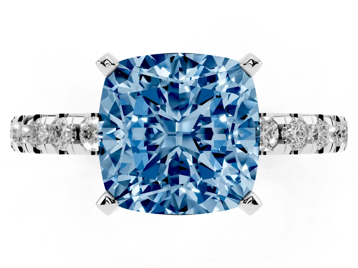 Fancy Blue Cushion Cut Diamond Solitaire Ring with Round Pavé Band and Four-Prong Setting Silver