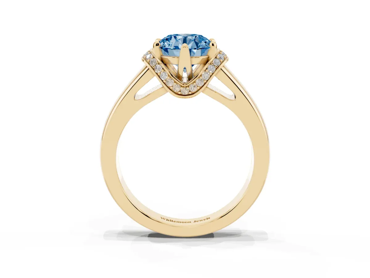 Fancy Blue Round Cut Solitaire Diamond Ring with Pave Band and Six-Prong Setting Yellow gold