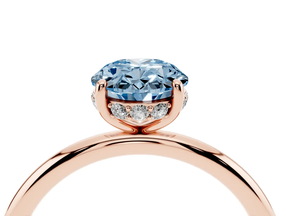 Fancy Blue Oval Cut Solitaire Diamond Ring with a Classic Band and Four-Prong Setting Rose gold
