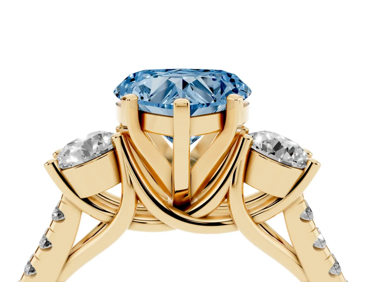 Fancy Blue Three-Stone Heart Cut Diamond Pavé Band with Four-Prong Setting Yellow gold