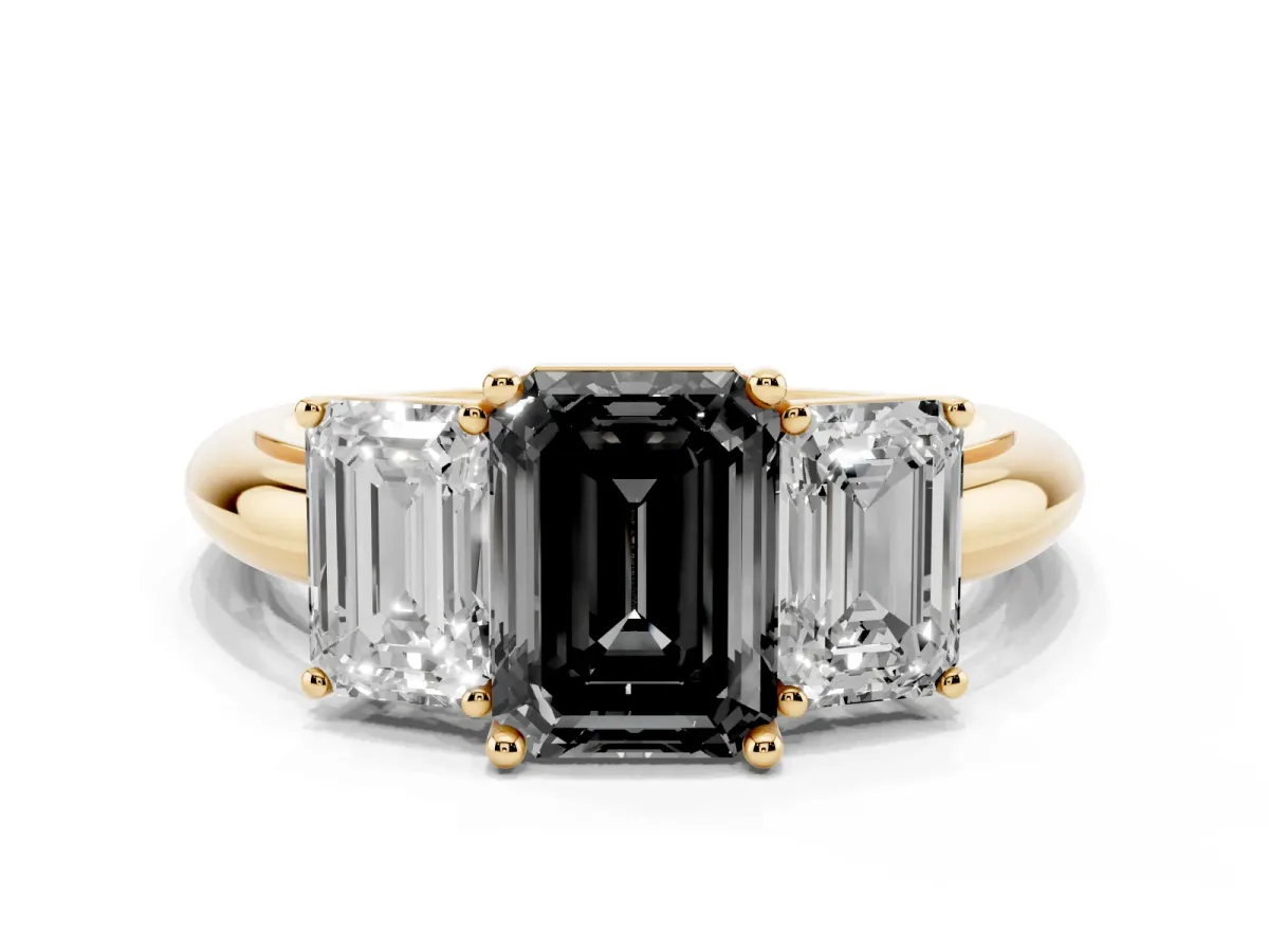 Fancy Black Three-Stone Emerald Cut Cut Diamond Engagement Ring with Prong Setting on a White Gold Band Yellow gold