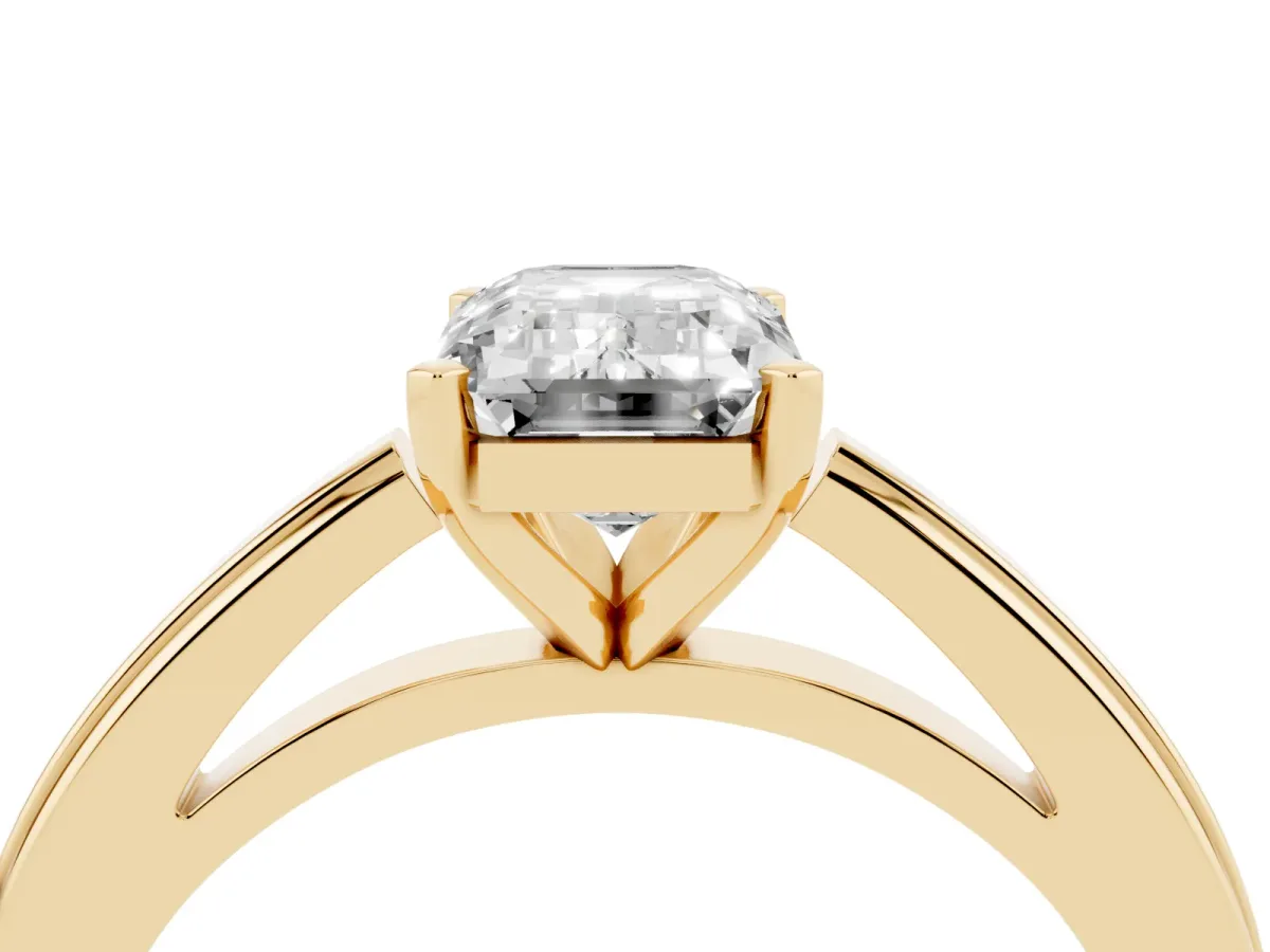 Emerald Cut Solitaire Diamond Ring with Four-Prong Setting and Classic Band Yellow gold