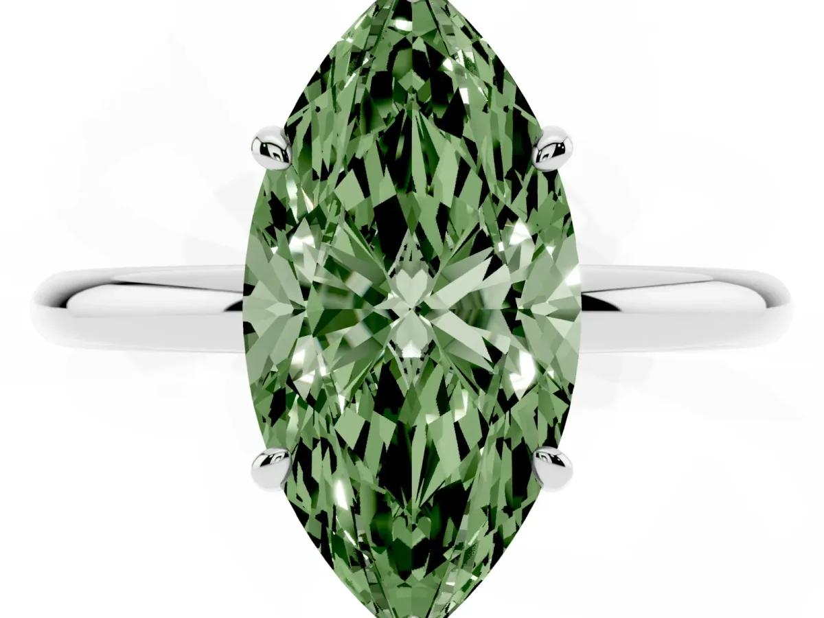 Fancy Green Oval Cut Solitaire Diamond Ring with Four-Prong Setting on a Plain Band Silver
