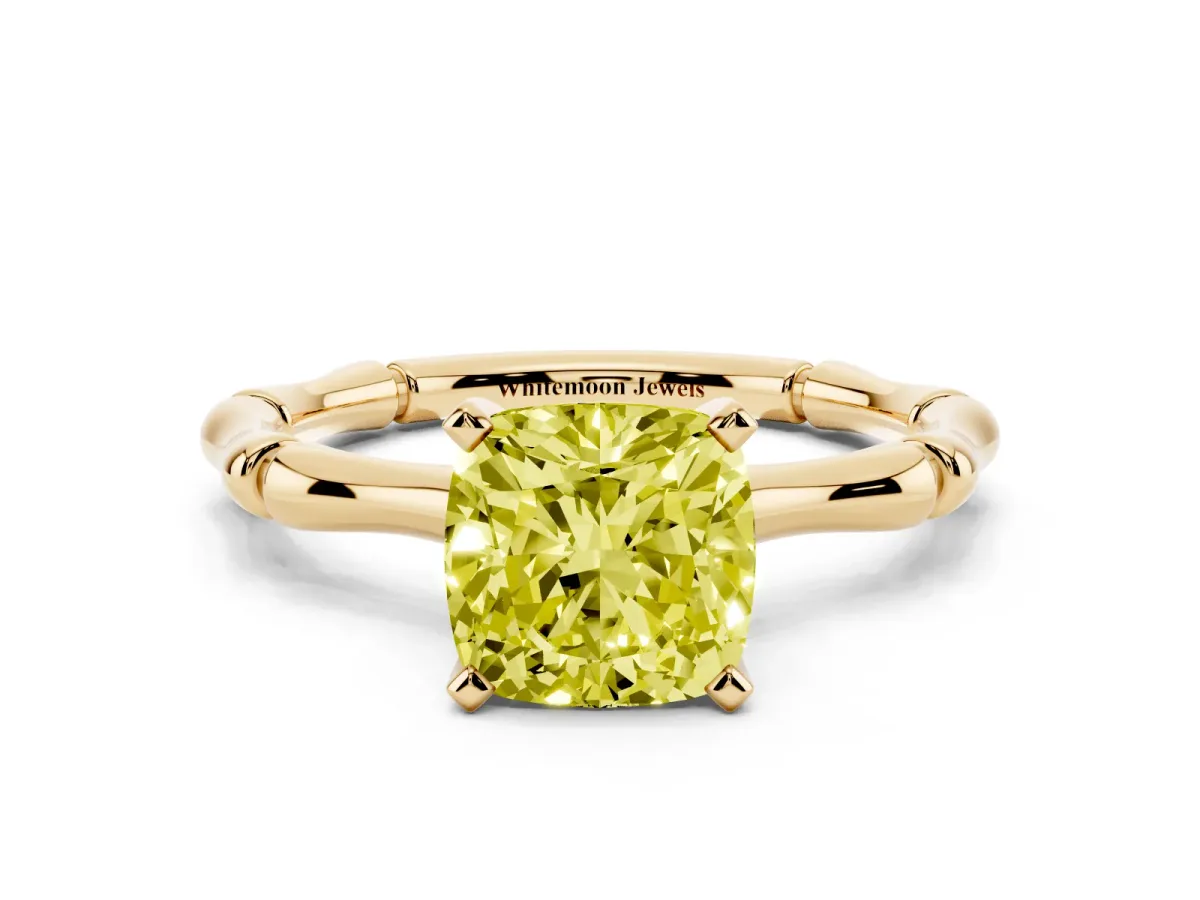Fancy Yellow Cushion Cut Solitaire Diamond Ring with Bamboo Band and Four-Prong Setting Yellow gold