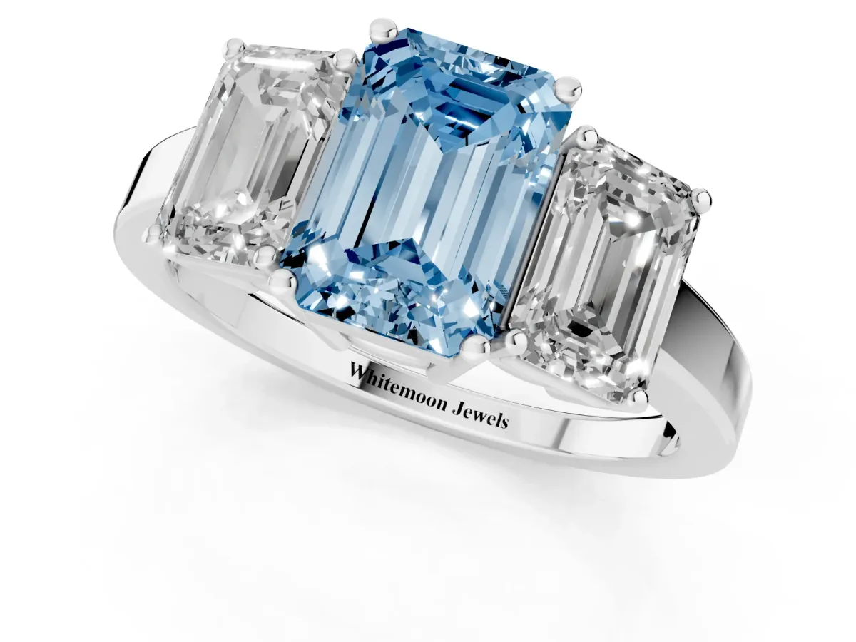 Fancy Blue Three-Stone Emerald Cut Cut Diamond Engagement Ring with Flat Band and Four-Prong Setting Platinum