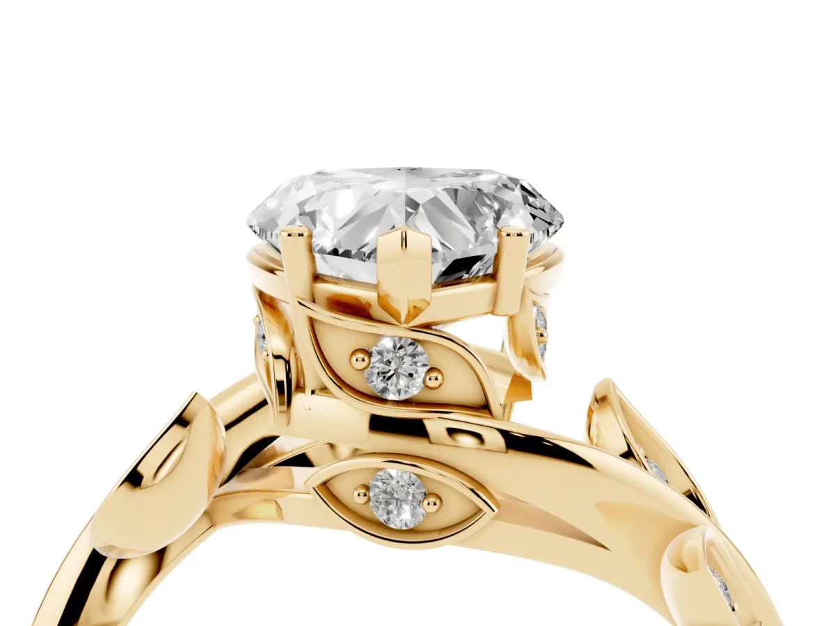 Heart Cut Solitaire Twist Engagement Ring with Leaf Accents and Prong Setting Yellow gold
