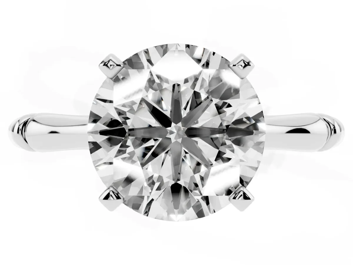 Round Cut Solitaire Diamond Ring with Bamboo Band and Four-Prong Setting Silver