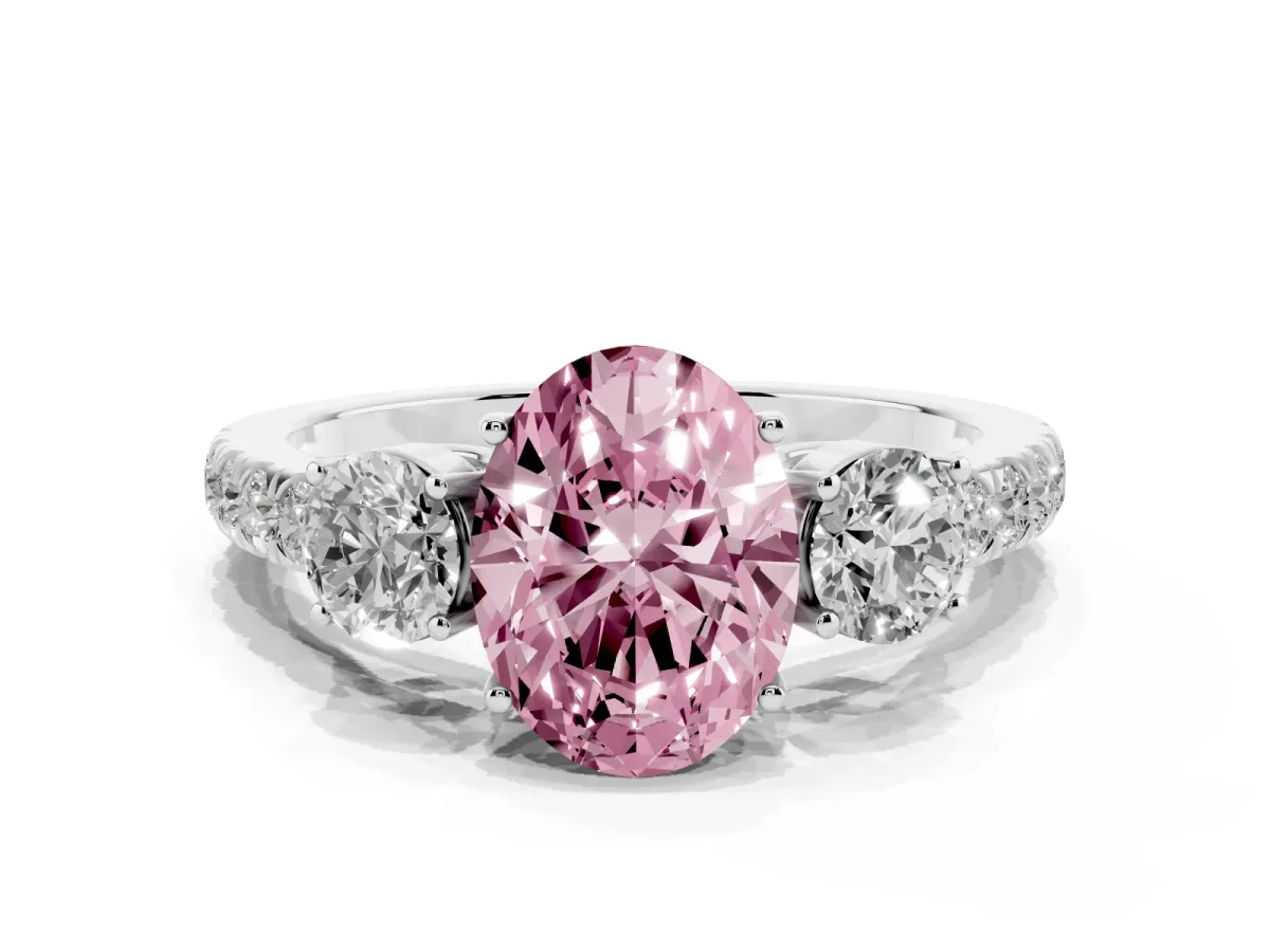 Fancy Pink Oval Cut Cut Diamond Three-Stone Ring with Round Side Stones and Pavé Band Silver