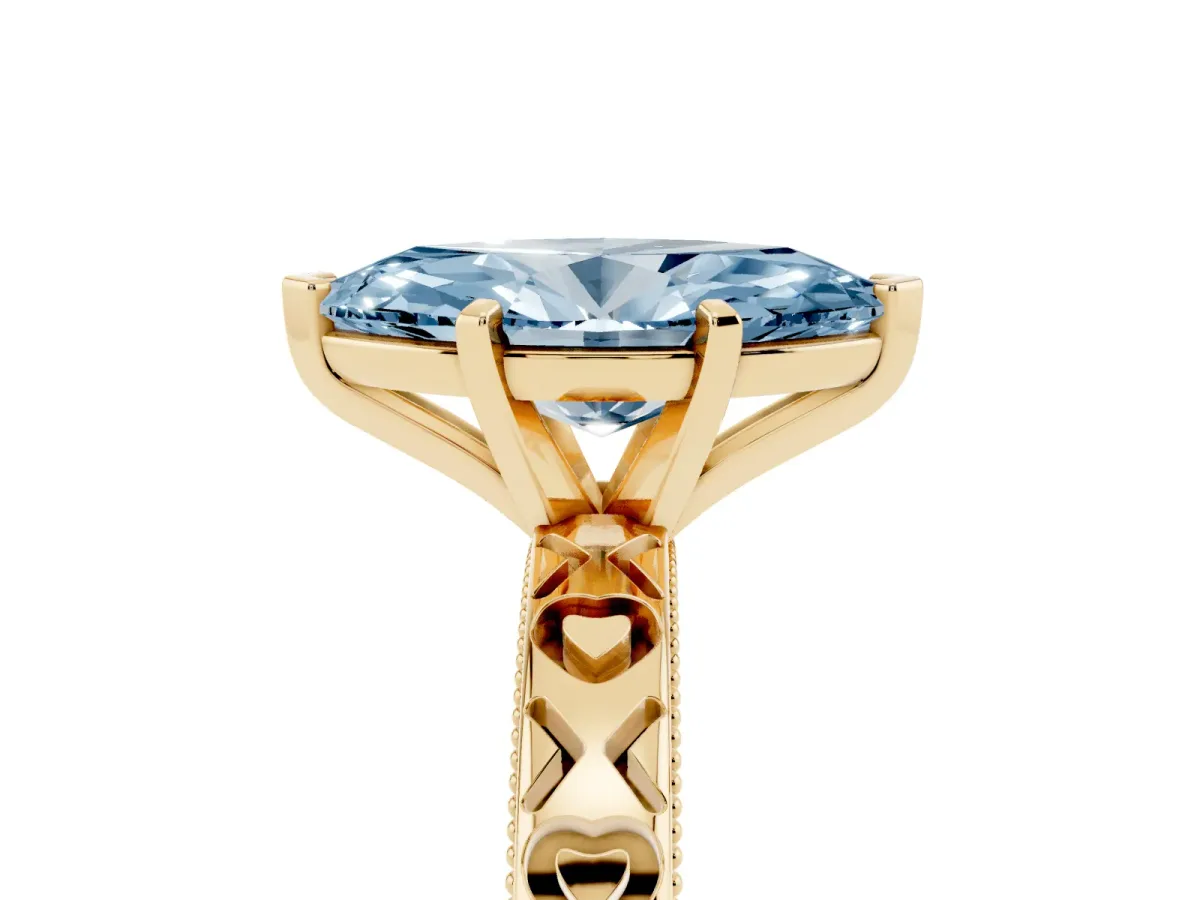 Fancy Blue Marquise Cut Solitaire Diamond Engagement Ring with XO Engraved Band and Four-Prong Setting Yellow gold
