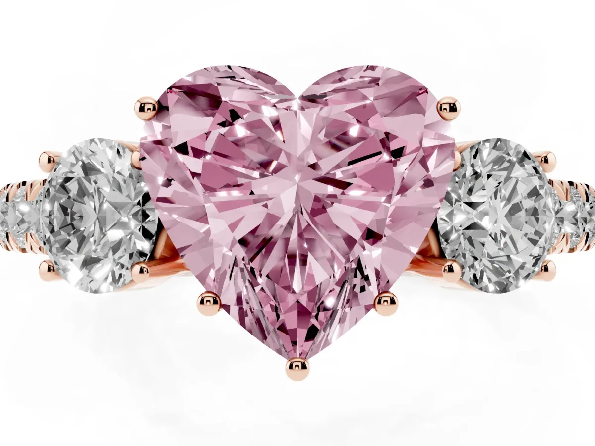 Fancy Pink Heart Cut Cut Diamond Three-Stone Ring with Round Side Stones and Pavé Band Rose gold