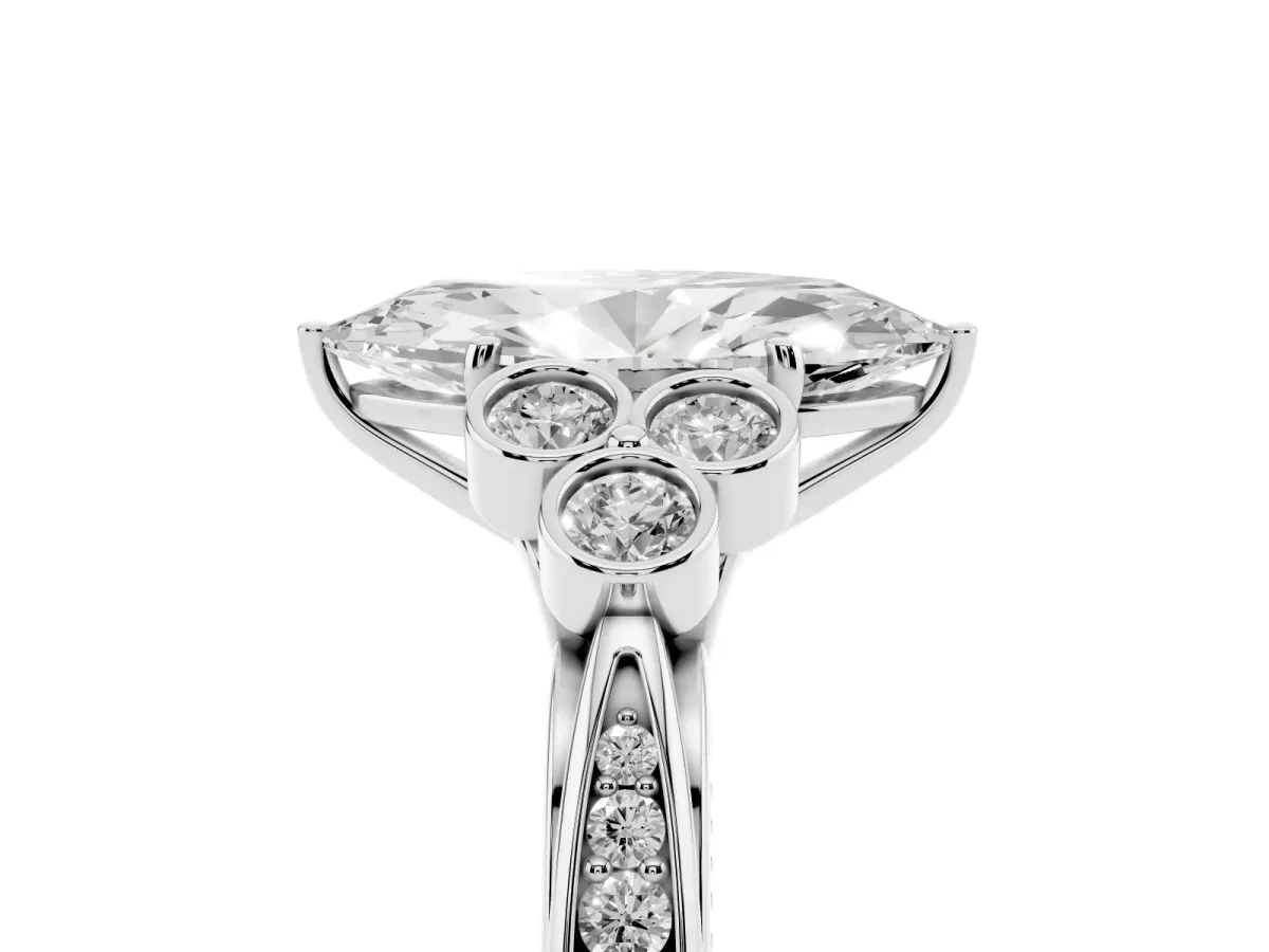Marquise Cut Cut Diamond Engagement Ring with Bezel Set Round Side Stones and Prong Setting Silver