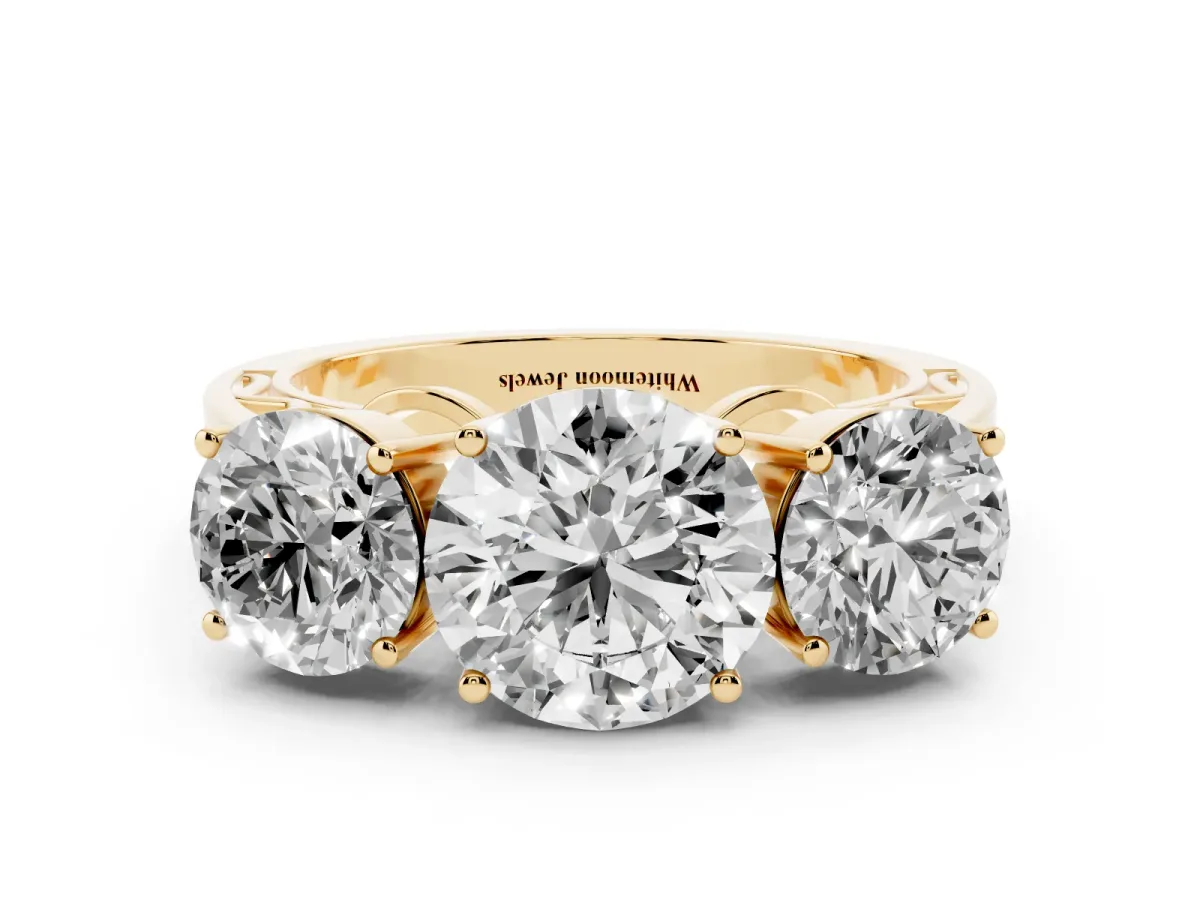 Round Cut Diamond Three-Stone Ring with Prong Setting and Textured Band Yellow gold