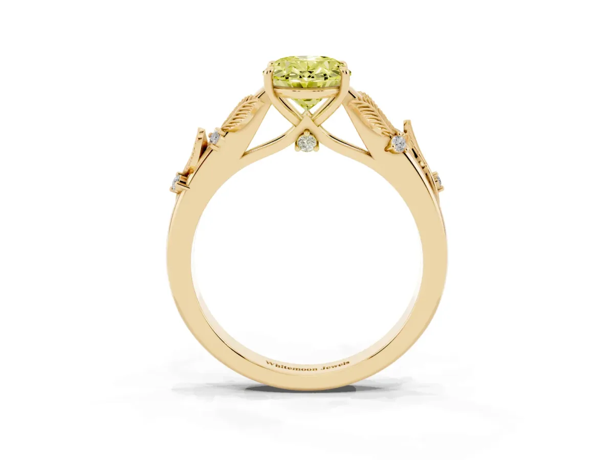 Fancy Yellow Oval Cut Diamond Solitaire Ring with Leaf Motif Band and Four-Prong Setting Yellow gold