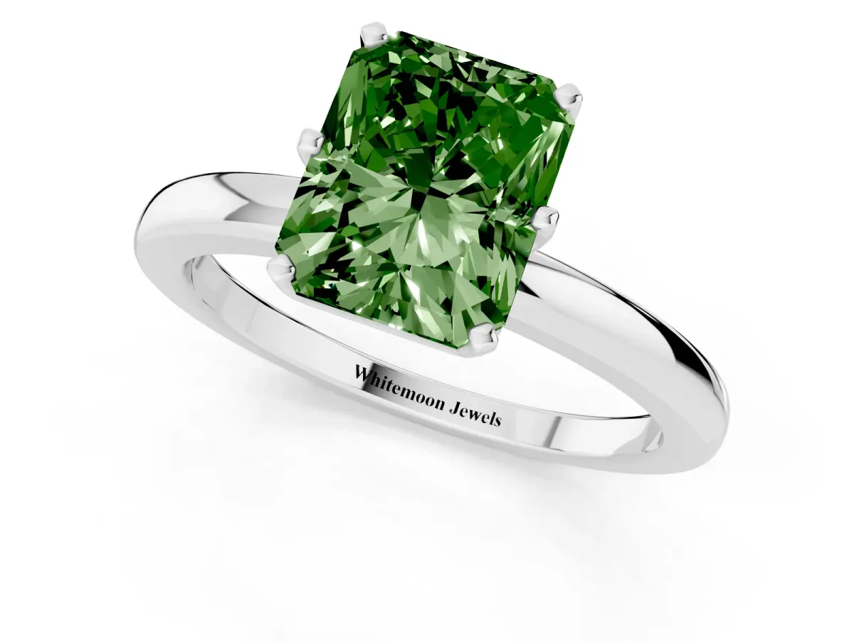 Fancy Green Radiant Cut Solitaire Diamond Ring with Six-Prong Setting on a Classic Band Silver