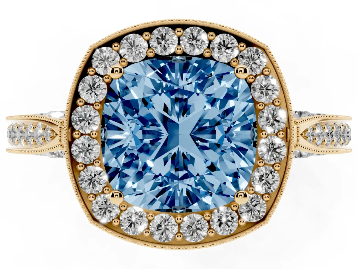 Fancy Blue Cushion Cut Halo Diamond Engagement Ring with Split Shank Band and Four-Prong Setting Yellow gold