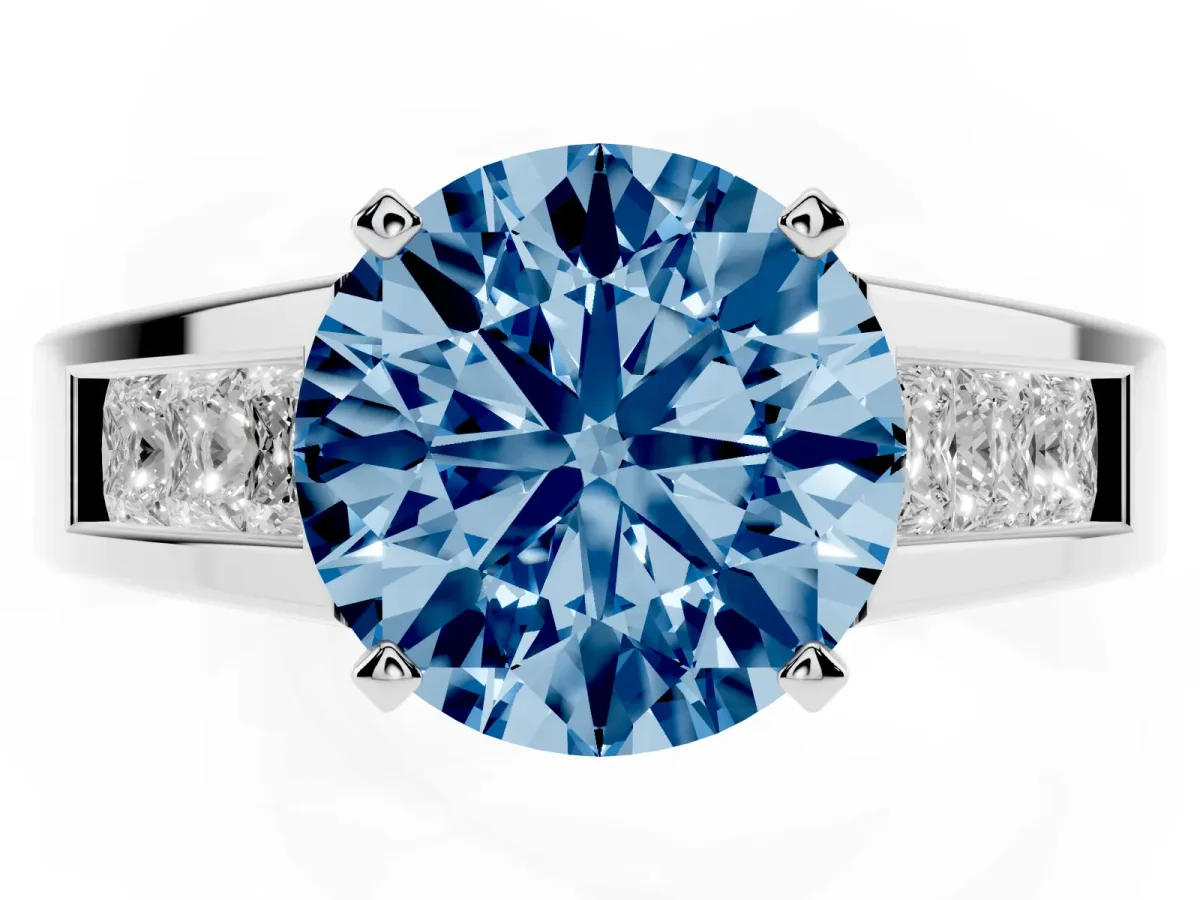 Fancy Blue Round Cut Cut Channel Set Solitaire Ring with Four-Prong Setting Silver