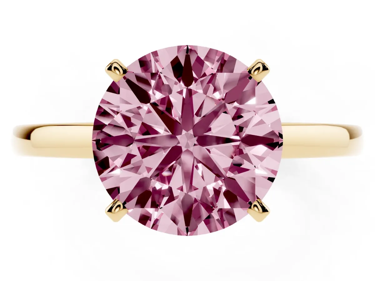Fancy Pink Round Cut Solitaire Diamond Engagement Ring with Four-Prong Setting on a Classic Band Yellow gold