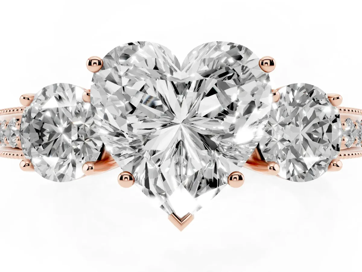 Heart Cut Three-Stone Diamond Ring with Pavé Band and Four-Prong Setting Rose gold