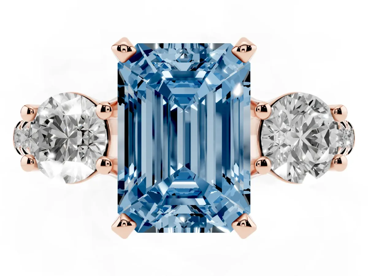 Fancy Blue Three-Stone Emerald Cut Diamond Pavé Band with Four-Prong Setting Rose gold