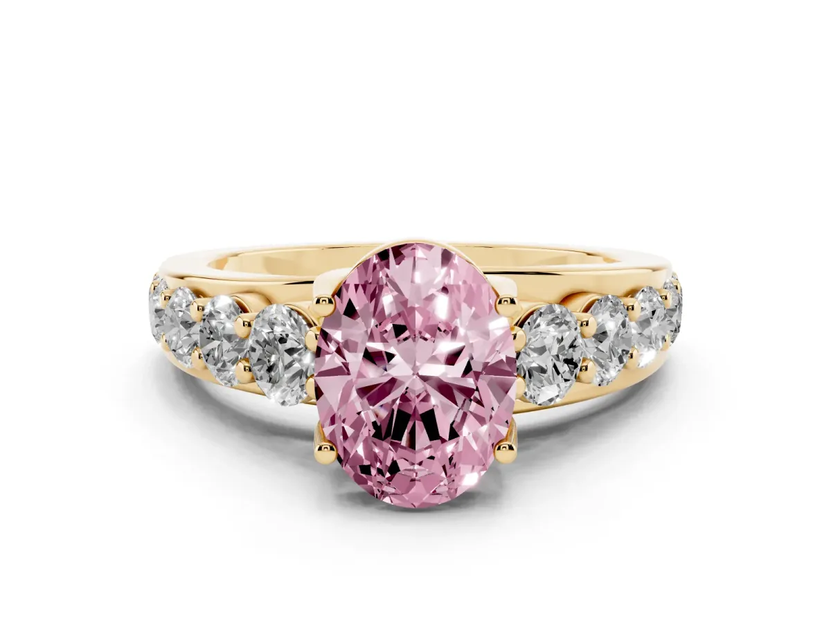 Fancy Pink Oval Cut Diamond Engagement Ring with Pavé Band and Four-Prong Setting Yellow gold